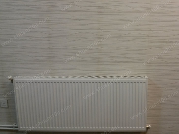 孝感暖气片安装效果图 洁白的暖气片与素色墙纸搭配和谐