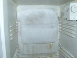 冰箱冷藏室结冰是什么原因—冰箱冷藏室结冰的解决办法